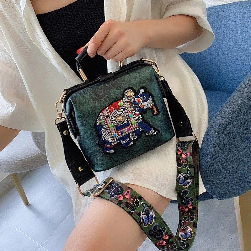 Embroidered Elephant Accent Handbags with Butterfly Strap
