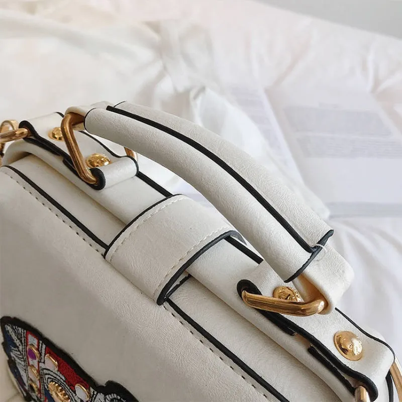 Embroidered Elephant Accent Handbags with Butterfly Strap